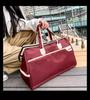 Women's Lightweight Waterproof Travel Crossbody Handbag: Large Capacity for Business or Sports.