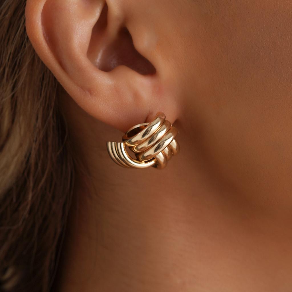 Light luxury ins style specification premium staggered earrings Internet celebrity winding spiral stud earrings
