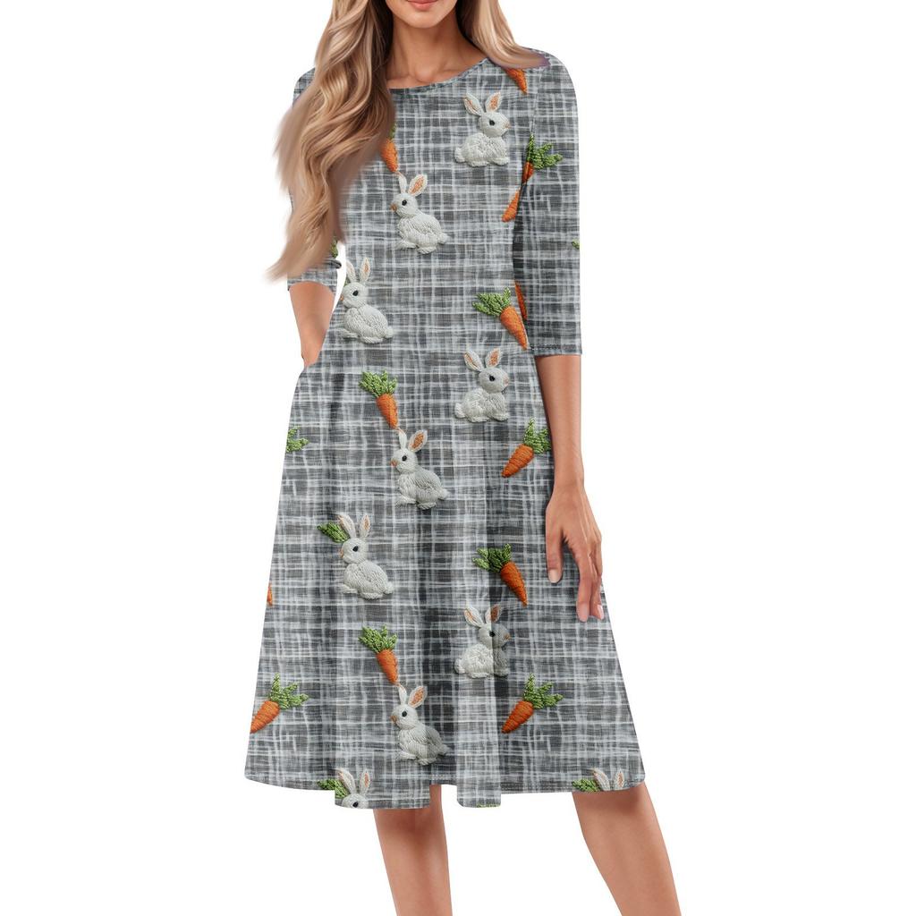 Dámské volné ležérní a módní šaty střední délky s potiskem, kulatým výstřihem a sedmčtvrtečními rukávy