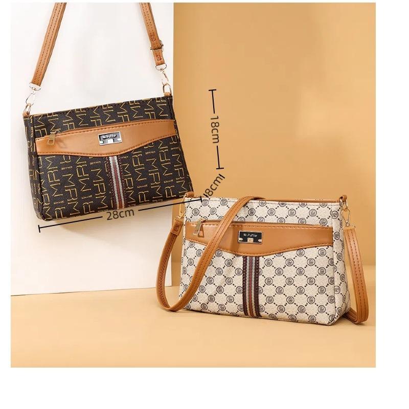 This Winter, the Popular Bucket Bag Women's New Oblique Span Shoulder Bag Printed Retro Women's Bag