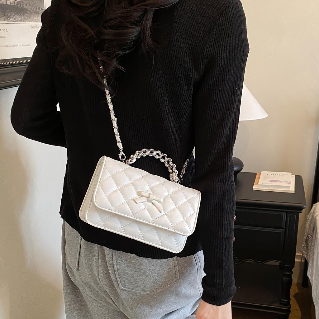 Sweet bow chain handbag, new design, elegant and versatile shoulder/crossbody bag, versatile, simple, stylish, and high-end commuting bag.