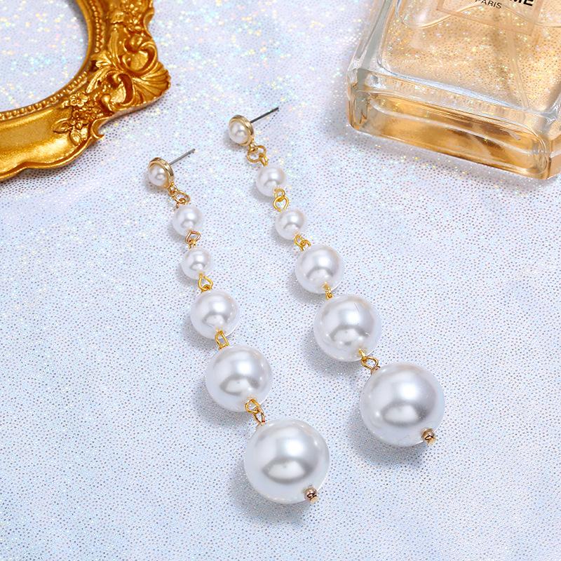 Retro personality pearl long stud earrings female versatile simple Internet celebrity temperament earrings fashion trendy earrings