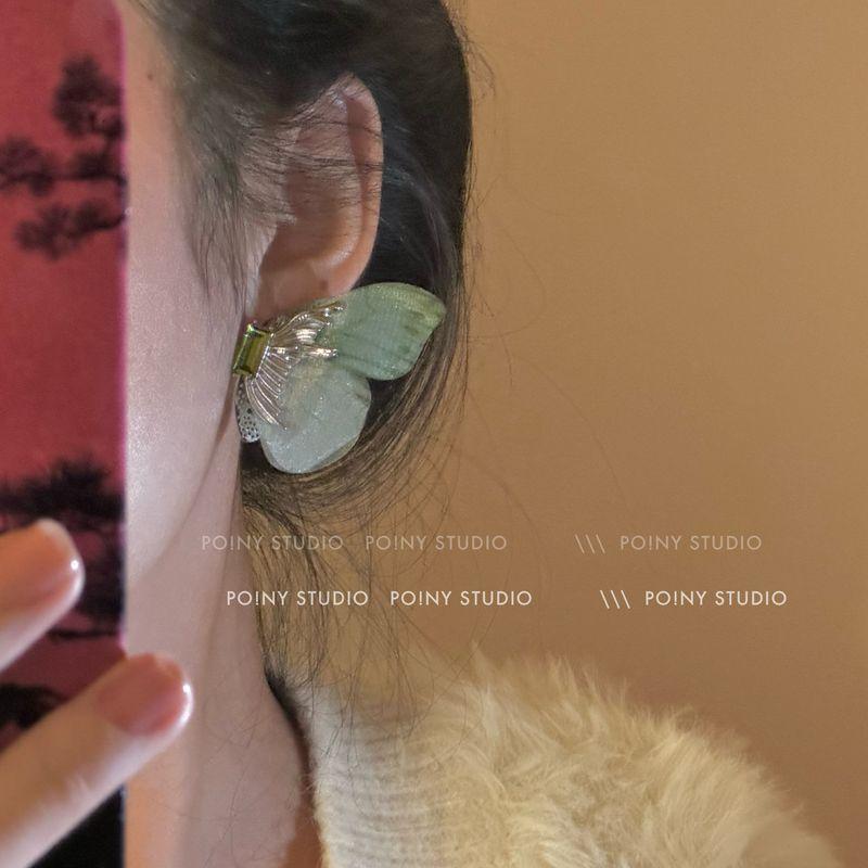 

Accessible Luxury Green Female Fall and Winter Minority Design Earrings Zircon 3887A Green Wing Butterfly Silver Needle
