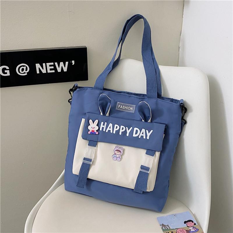 

New trend student tutoring bag cute girl rabbit ears contrasting color shoulder bag large capacity casual messenger bag one size fits all синій