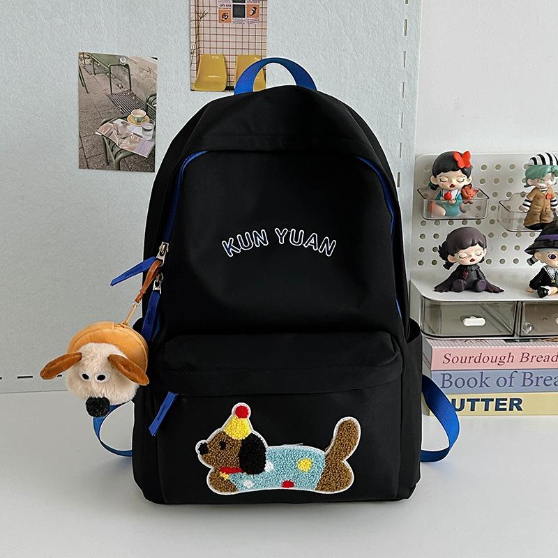 Schoolbag new cute puppy backpack large capacity primary school students junior high school students lightweight schoolbag simple fashion alphabet 