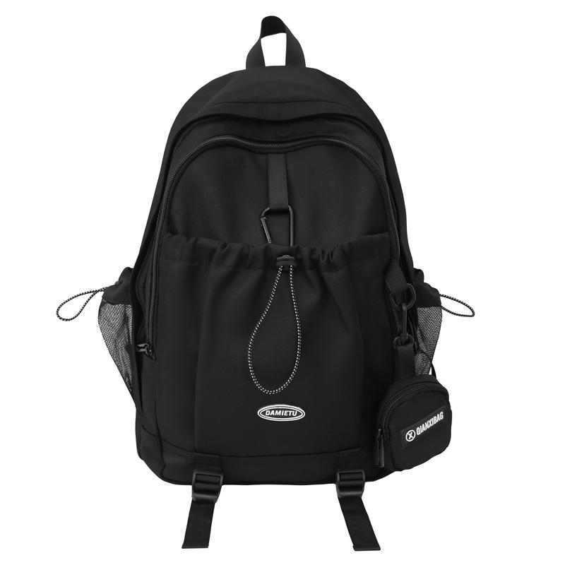 Backpack simple and fashionable college student junior high school student schoolbag female nylon large capacity leisure travel backpack male