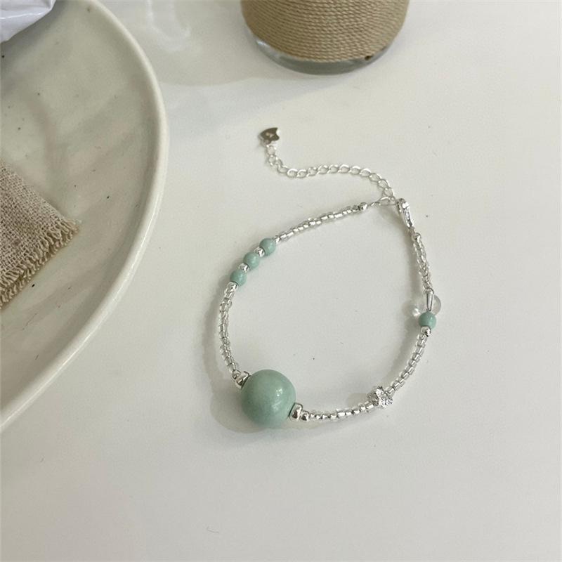 

Комплект из бус и браслета из мятно-зеленого алхаского агата в серебре S925 S925 Silver