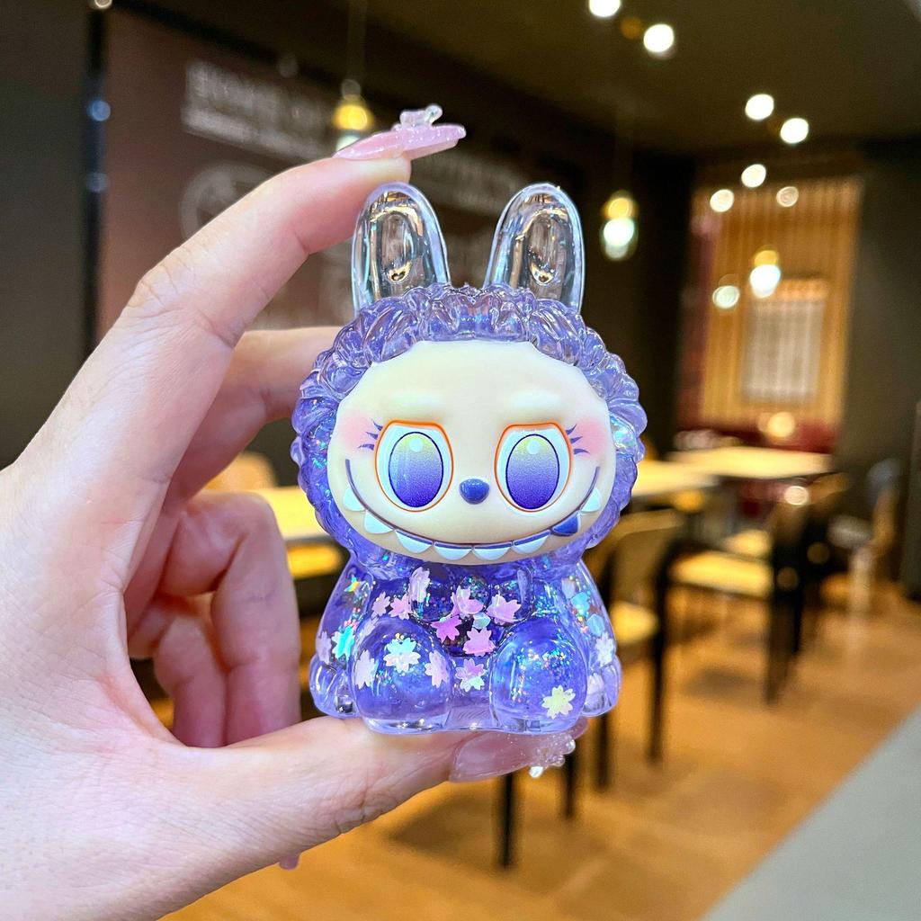 Kurutulmuş Çiçekler, Yanıp Sönen Renkli Boncuklar ve Yağ Şişesi ile Mengmeng Tavşan Hareketli Kum Süsleri - Sevimli Tahıl Aksesuarları ve Douyin'de Trend Oyuncaklar.