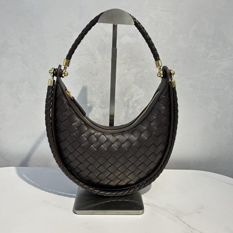 2025 Neue Damenhandtasche aus echtem Leder Handgewebte Achseltasche Vielseitige Halbmondtasche Einzelne Schulter Diagonale Umhängetasche Knödel-Damenhandtasche