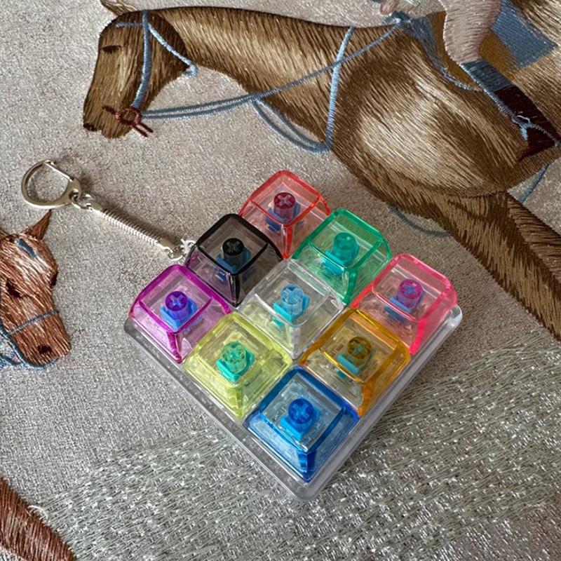 Tastiera a 9 Tasti Keycaps Portachiavi Giocattolo Fidget Keycaps Anti-Ansia Keycaps Festa Sollievo dallo Stress Keycaps Fai-da-Te Tappi Tastiera Giocattolo