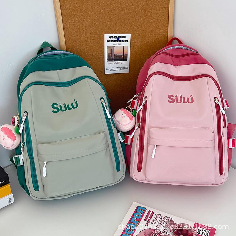 Schoolbag schoolbag female ins high value large capacity junior high school student backpack Japanese simple contrasting color backpack wholesale