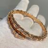 CNC Crafted spring snake bone bracelet with full diamond inlay, plated18K Rose gold elastic light-luxury high-end snake-shaped bracelet