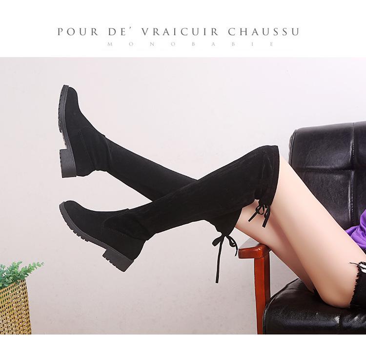 Dámské zimní mikroelastické kozačky nad koleno s vnitřním zvýšením na plochém podpatku 2023.