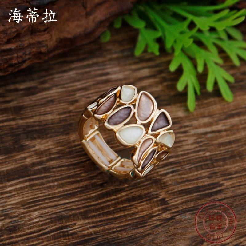 New enamel color hollow geometric petal elastic ring women's simple high-end versatile flower ring