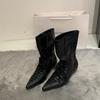Niche pointed strap loose mouth witch boots spring new big tube circumference small high heel short boots design sense women's boots