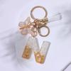 Chic White Tassel Letter Keychain with Resin Epoxy Pendant - Stylish Ornament for Bags