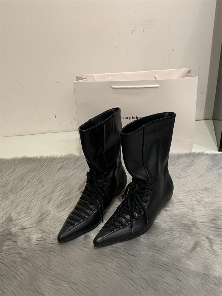 Niche pointed strap loose mouth witch boots spring new big tube circumference small high heel short boots design sense women's boots