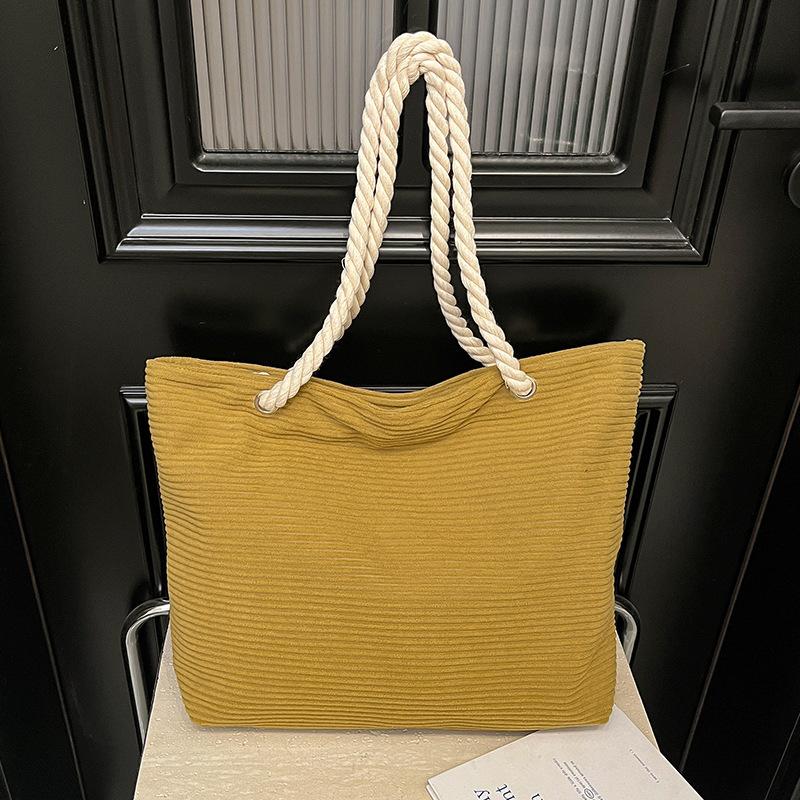 

Популярная нишевая дизайнерская сумка-тоут большой вместимости на осень и зиму, женская, новая 2025 года, в иностранном стиле, повседневная для работы, простая на плечо жёлтый