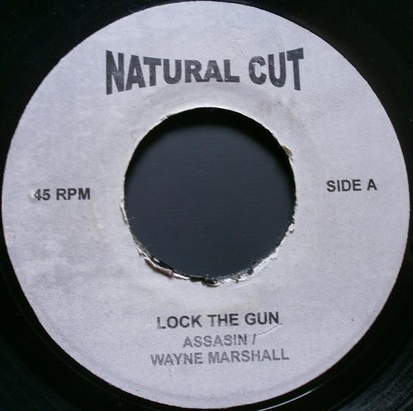 

7-дюймовая пластинка ASSASIN WAYNE MARSHALL Lock The Gun NONE Natural Cut 2002 Ямайка Рэп Хип-Хоп R&B Б/у