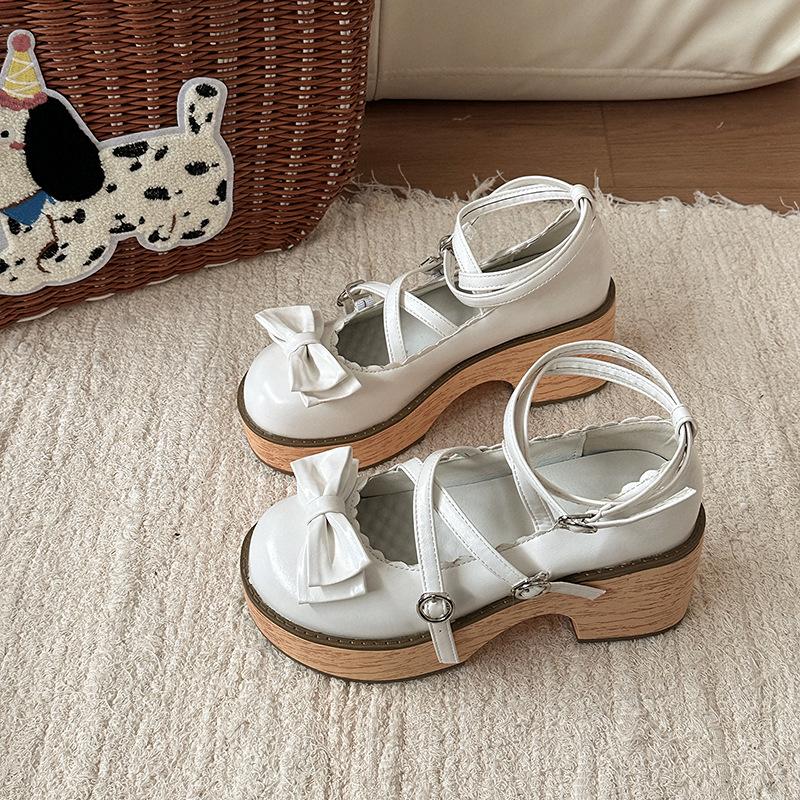 Cute bow Mary Jane shoes women's autumn design thick heel with skirt cross strap high heel single shoes tide