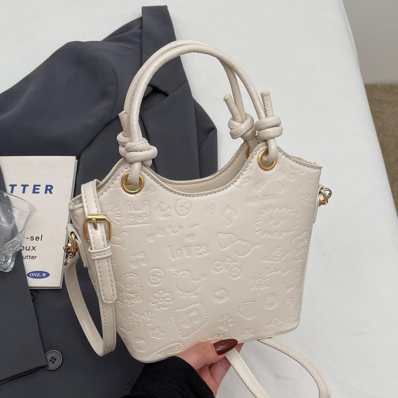 Korean Niche Fashion Cute Embossed Portable Vegetable Basket Bag Women's Spring Fashion Versatile Commuter Messenger Bag