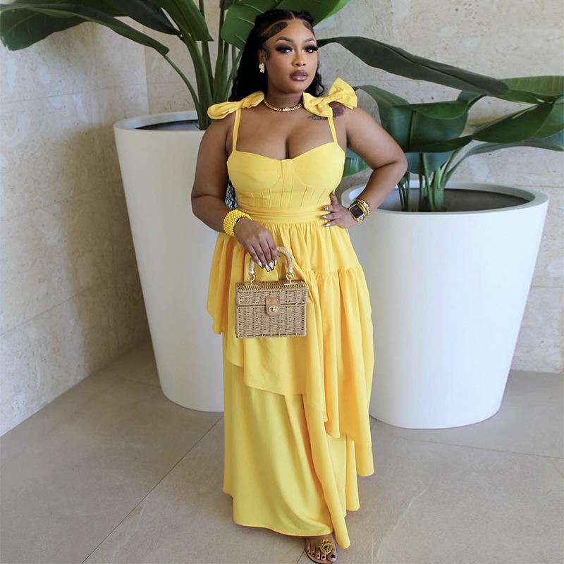 In stock, European and American women's clothing spring and summer new bow suspender V-neck ruffle edge long dress dress