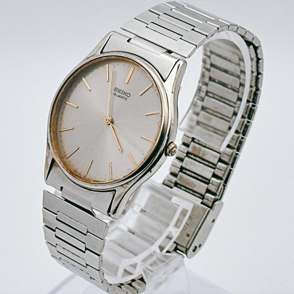 Used vintage SEIKO 80s men's watch silver dress watch slim