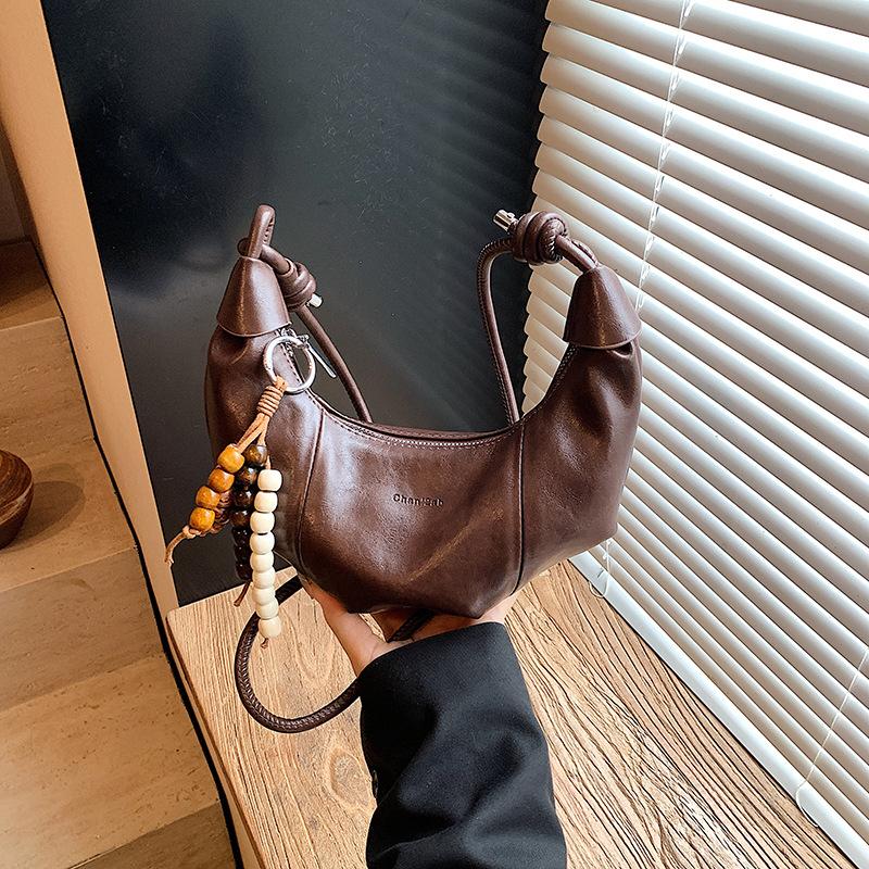 Premium retro dumpling bag women's new fashion casual shoulder messenger bag niche commuter bag