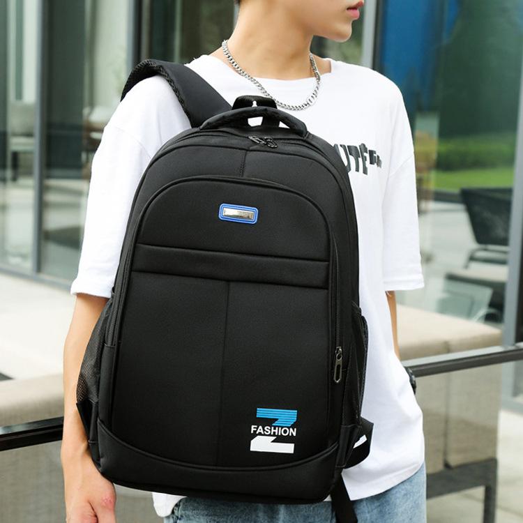 Schoolbag Light and simple backpack wholesale leisure business computer backpacking travel large capacity burden reduction middle school students