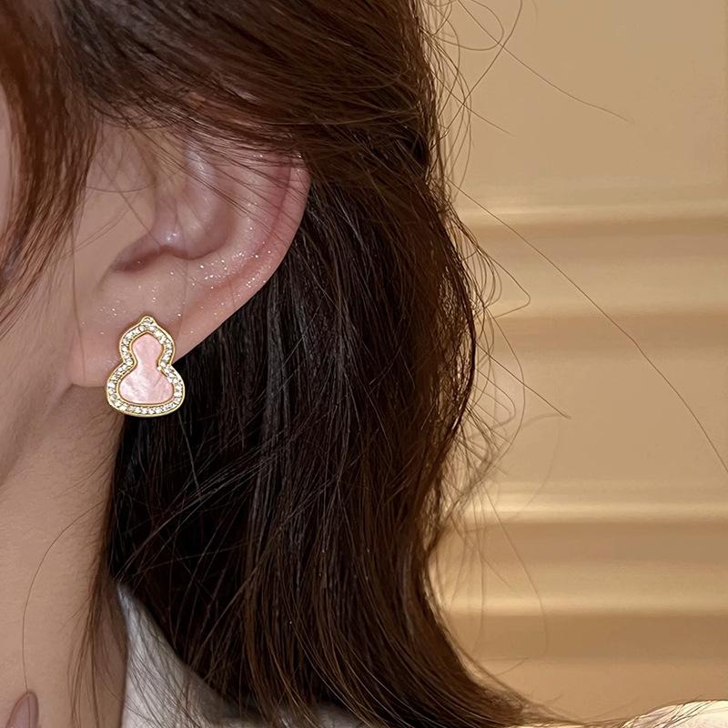 No ear piercings, Ankola red gourd mosquito coil disc ear clips, new earrings, women s micro-inlaid zircon stud earrings, light luxury