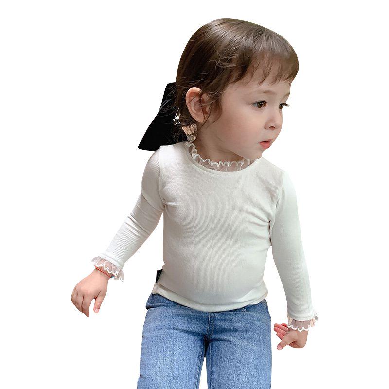 

Мила блузка з довгим рукавом і ляльковою шиєю з бахромою для дівчинки в осінньо-зимовому стилі 130
