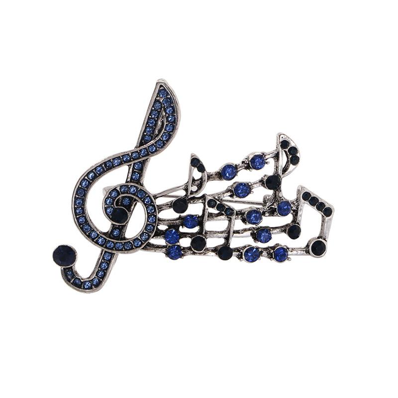 Spring and summer new alloy diamond music symbol brooch femininity high sense fashion music note clothing corsage