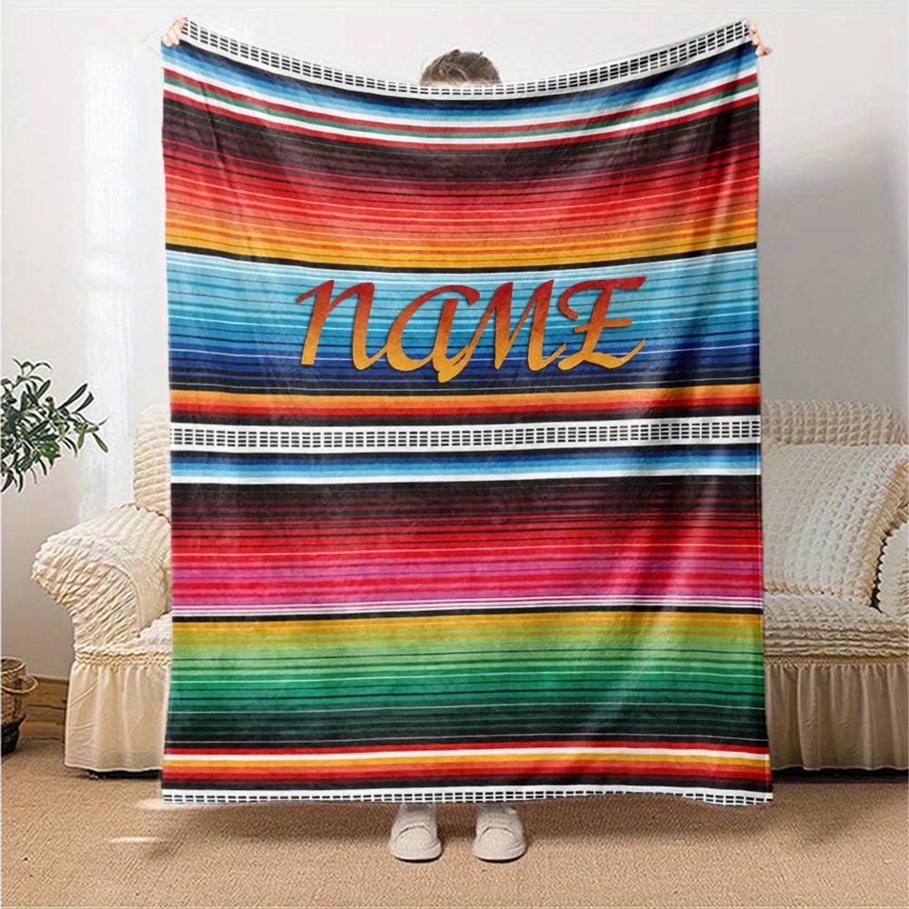 The Image Features A Vibrant Colorful Striped Fabric With Bold Horizontal Bands In Various Hues Including Red Blue Yellow Green And Black Gift