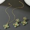 Atmospheric Green Oil-drop Flower Necklace and Earrings Set