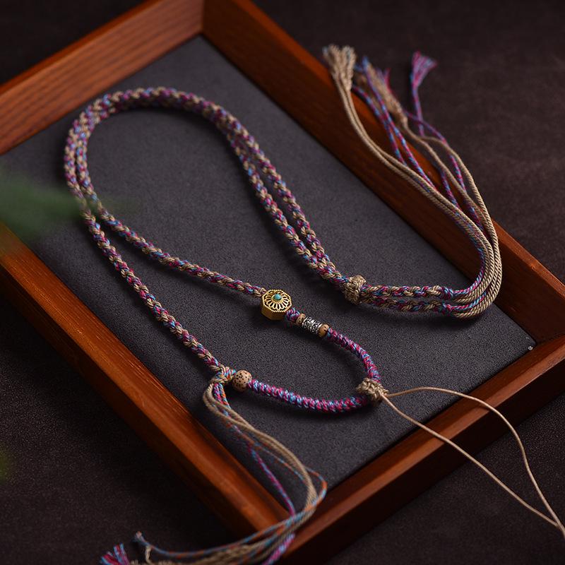 

Тибетское ожерелье из плетеного шнура ручной работы и кулон-амулет