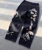 Pantalones vaqueros unisex estilo gótico Y2K con bordado de flores de cerezo para hombre y mujer, estilo streetwear, pierna ancha, estilo holgado.