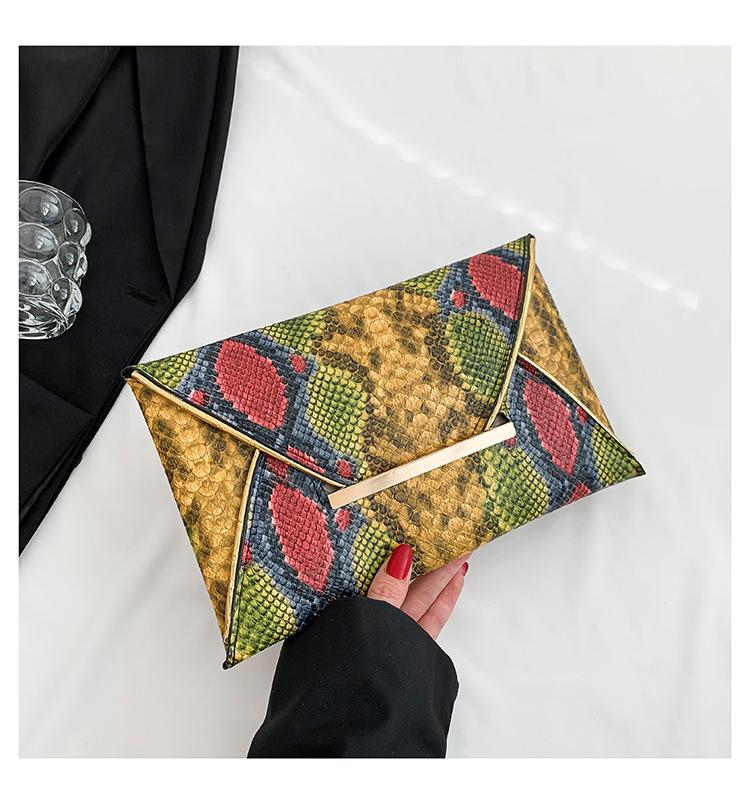 

Новый змеиный узор персонализированная мода 2025 осенний тренд простая мода простая ручная сумка-конверт женская жёлтый