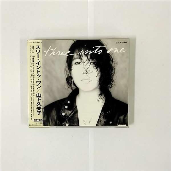 

CD KUMIKO YAMASHITA - three into one 32CA3004PROMO Japan ObiJapanese Pop/Rock Used