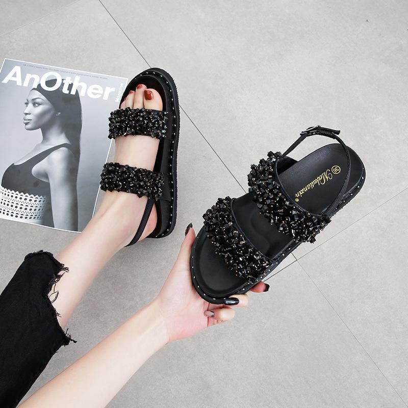 2025 Sommer neue Zehenfreie Dicksohlige Ein-Wort-Schnallen-Sandalen Damen Koreanische Version Vielseitige Lässige Flachboden-Strand-Römersandalen