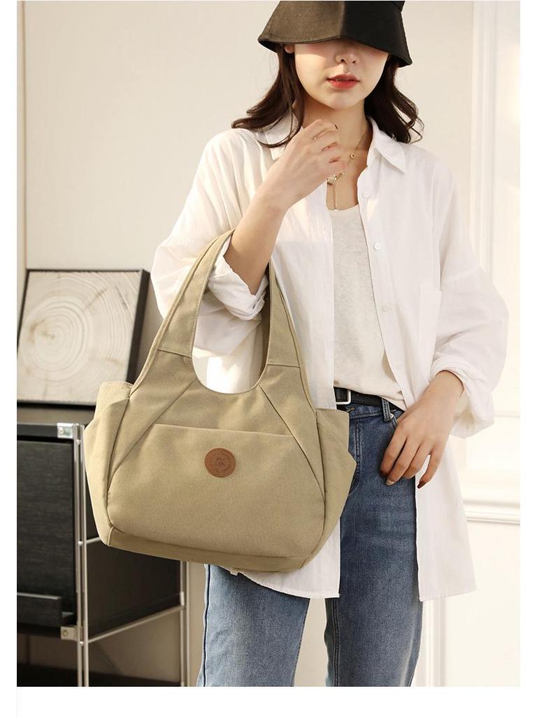 2025 Women's One-Shoulder Bag: Trendy, Versatile Canvas Handbag with Large Capacity, Simple Korean Style, Solid Color.
