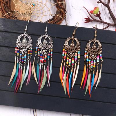 Boho-Frauen-hohle geschnitzte Kreis-Feder-Quasten-baumelnde Haken-Ohrringe Schmuck