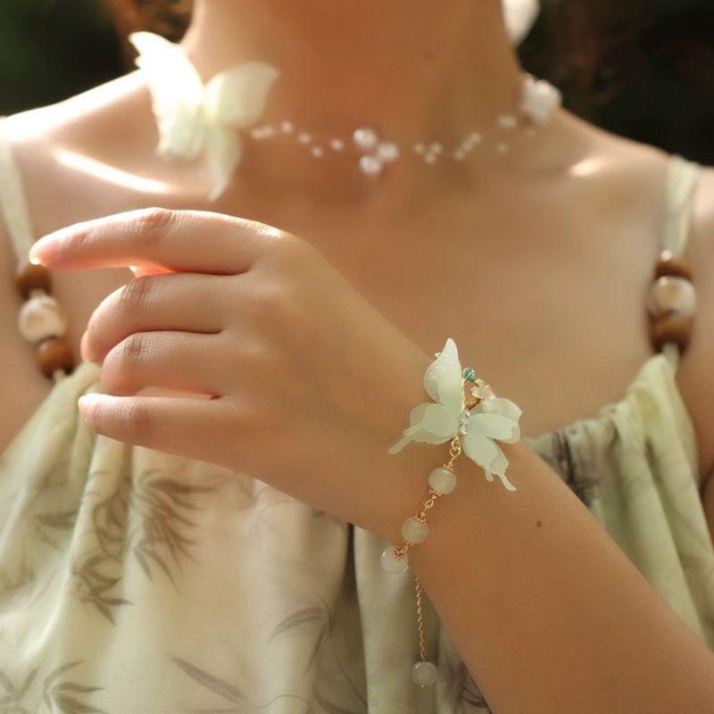 

Butterfly Pearl Bracelet Necklace Ribbon Clavicle Chain Three-dimensional Flower Jewelry Set Igh-end Niche Personalized Gift