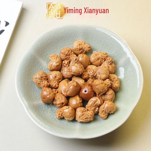 Yi Ming Xian Yuan Sandalwood Carved Fu Character Ornaments: Copper Coin, Axe, Peanut, Radish, and Mushroom.