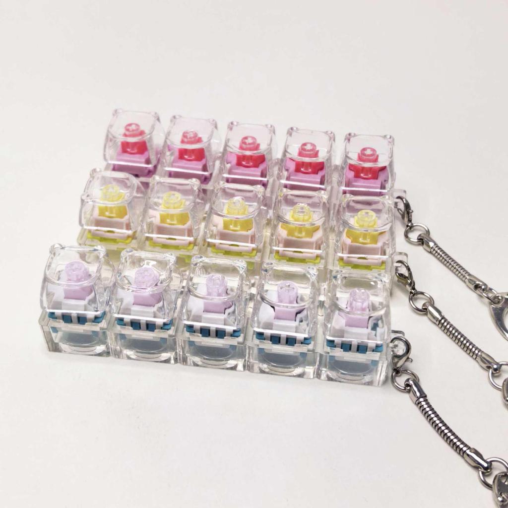 Stummer mechanischer Tastatur-Schlüsselanhänger mit 5,6 Kreuzachsen-Tasten und hochtransparenten Tastenkappen; Dekompression Spielzeug.