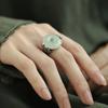 Adjustable Round Jade Ring with Metal Band and Engraved Center Piece Suitable for Various Finger Sizes and Daily Wear