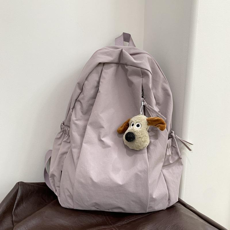 Travel lightweight advanced sense niche backpack college student commuter junior high school girls schoolbag Japanese and Korean simple backpack