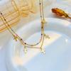 gold cross pendant layered necklace with colorful beads for women