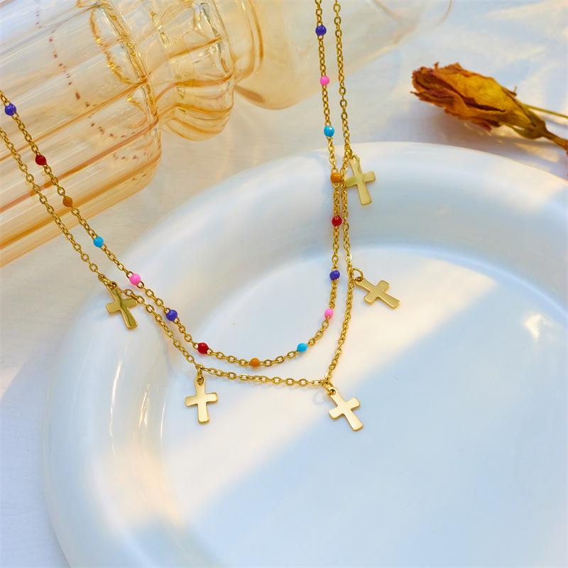 gold cross pendant layered necklace with colorful beads for women
