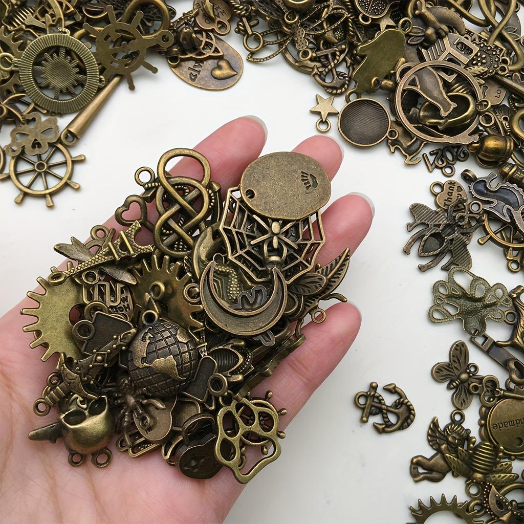 Misto Vintage 100pz Casuale Lega Bronzo Antico Ciondolo Charms Fatto a Mano DIY Bracciale Pendenti
