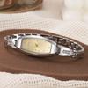 Pas de boîte cadeau Nouvelle montre à quartz délicate pour dames à petit cadran en forme de tonneau bracelet de perles ensemble de 4 pièces